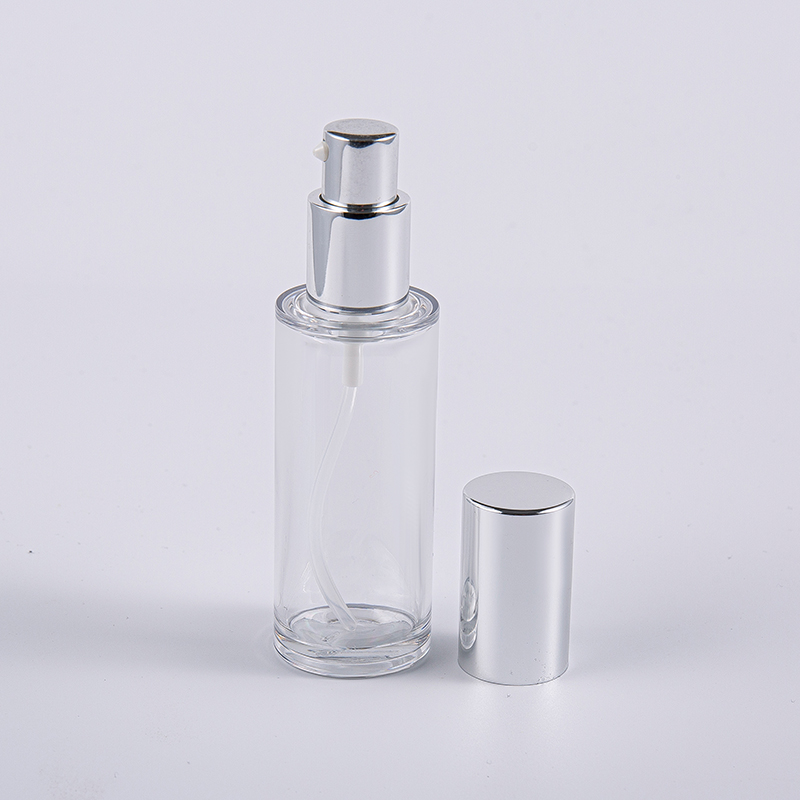 Wysokiej jakości okrągła butelka na balsam o pojemności 35 ml z aluminiową pompką do użytku w podróży Wysokiej jakości okrągła butelka na balsam o pojemności 35 ml z aluminiową pompką do użytku w podróży